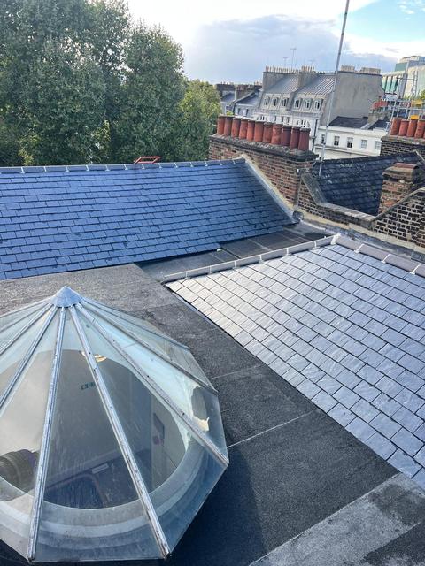 Flat roof and slate slope with roof lantern