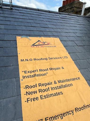 M.N.O site banner on the job