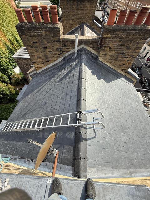 New slate roof between the chimney stacks